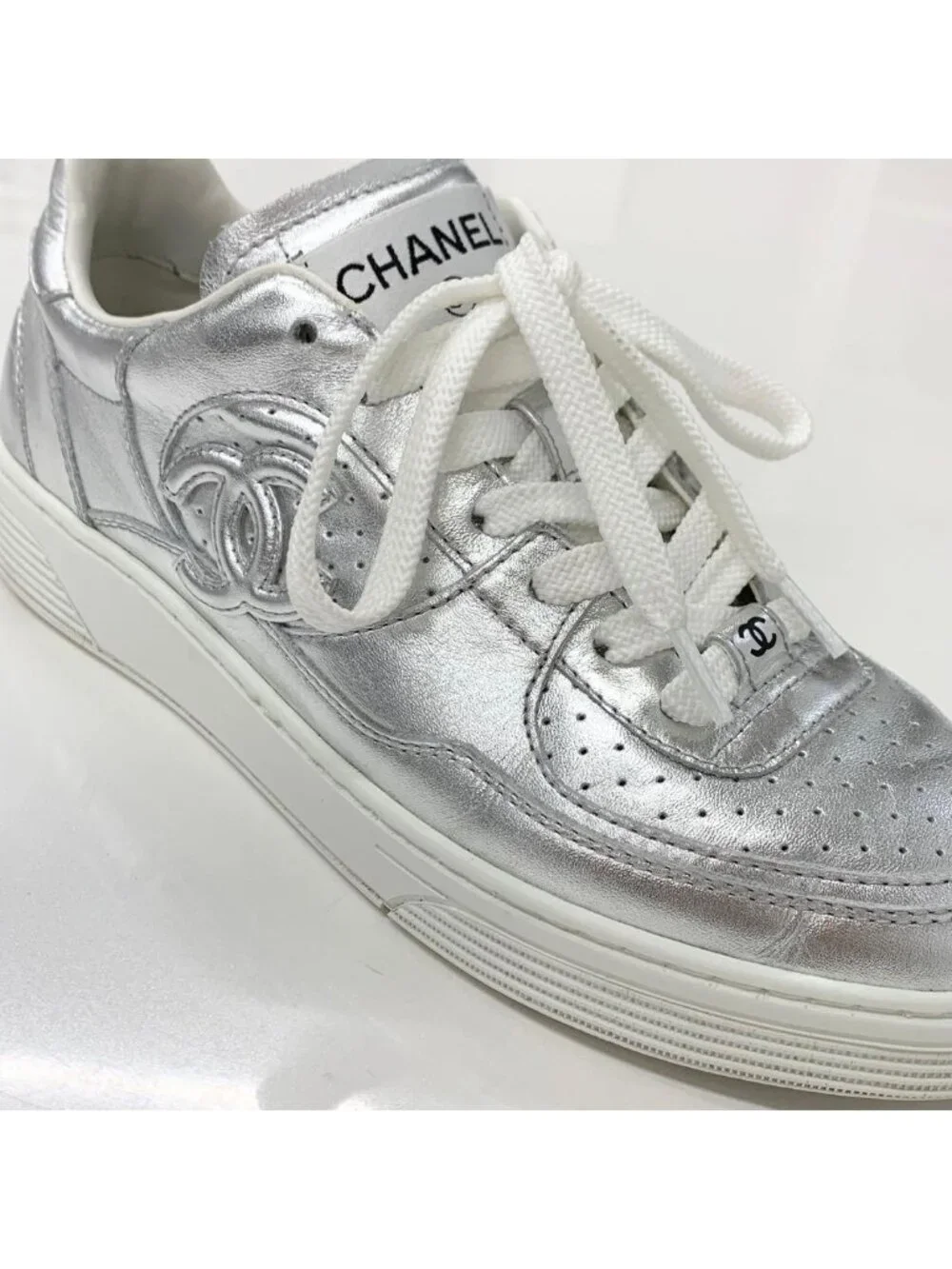 Chanel CC Logo Perforated Leather Sneakers Silver